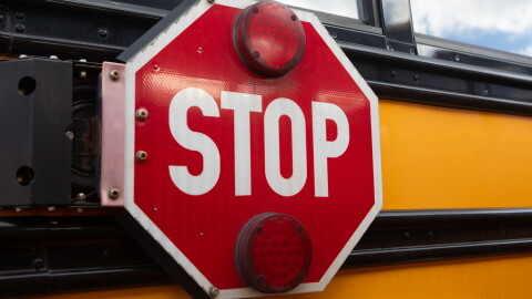 A school bus during a 2024 Pennsylvania state government news conference. High diesel prices cause financial challenges for both bus drivers and school districts.
