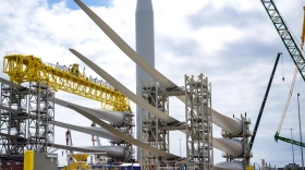 Workers and officials gather at the State Pier in New London on August 25, 2025 to discuss the Trump administration’s order to halt construction on Revolution Wind, an offshore wind project that has been in constructions since 2023 and is already 80% completed.