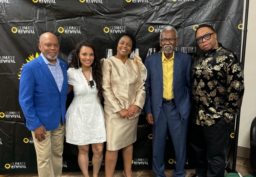 Antonique Smith (second from left) poses for a photo with Rise St. James founder Sharon Lavigne, Concerned Citizens of St. John founder Robert Taylor and Hip Hop Caucus President Rev. Lennox Yearwood at Climate Revival's gospel concert in St. James Parish on Oct. 10, 2024.