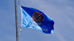 The Oklahoma state flag flies outside of the Oklahoma City Federal Building on June 24, 2025, in midtown Oklahoma City.
