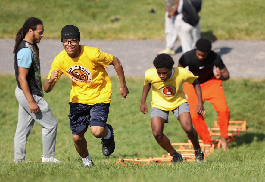 Davion Demos takes part in a hill-climbing drill during the Hoop N’ Holla summer basketball camp in Rochester. Demos, who is currently between schools, did not play basketball last season, instead using the year to train and prepare for the upcoming season.