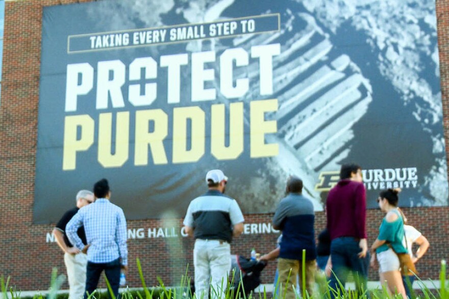 Remote workers tour the Purdue University campus for a talent attraction program that awards them co-working space and a stipend for relocating.