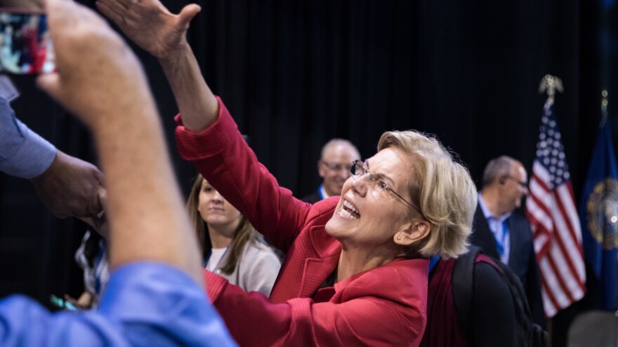 Democratic presidential candidate Sen. Elizabeth Warren shakes hands with supporters after speaking at the New Hampshire Democratic Party Convention in Manchester, N.H., last week.