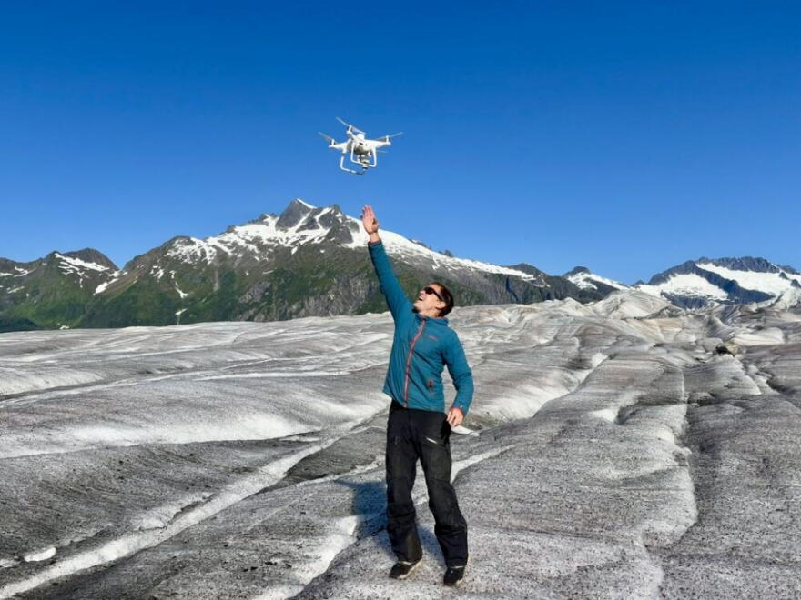 University of Alaska Southeast scientist Eran Hood conducts a done survey of the Mendenhall glacier after this year’s glacial lake outburst flood. (Peter O'Dowd/Here & Now)