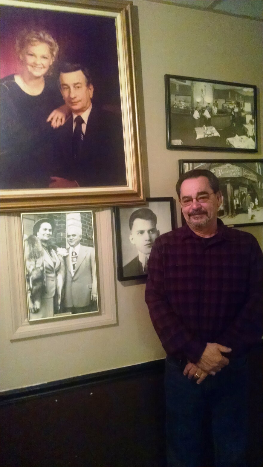 Jack Yacovelli stands besides the pictures of his parents (top) and grandparents (bottom), who were owners of the Yacovelli restaurant before him.