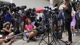 Attorney Deanna Shullman, who represents the Wall Street Journal, talks with the news media outside of the Paul G. Rogers Federal Courthouse, Thursday, Aug. 18, 2022, in West Palm Beach, Fla. Attorneys for the nation's largest media companies are presenting their case before a federal magistrate judge to make public the affidavit supporting the warrant that allowed FBI agents to search former President Donald Trump's Mar-a-Lago estate in Florida.