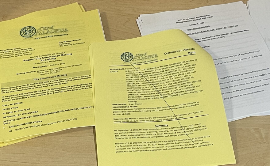 The ordinance 26-17 was crossed out in the handouts of the agenda, and residents were worried at the start of the meeting Monday that the topic of the moratorium on data centers was not going to be addressed. The ordinance was brought up in the meeting, and residents were allowed to comment. (Dulce Rodriguez-Escamilla/WUFT News)