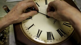 Howard Brown repairs a clock at Brown's Old Time Clock Shop in Plantation, Florida. (Joe Raedle/Getty Images)