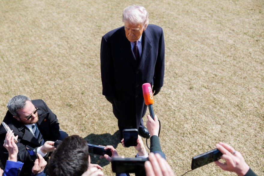 President Donald Trump speaks to reporters