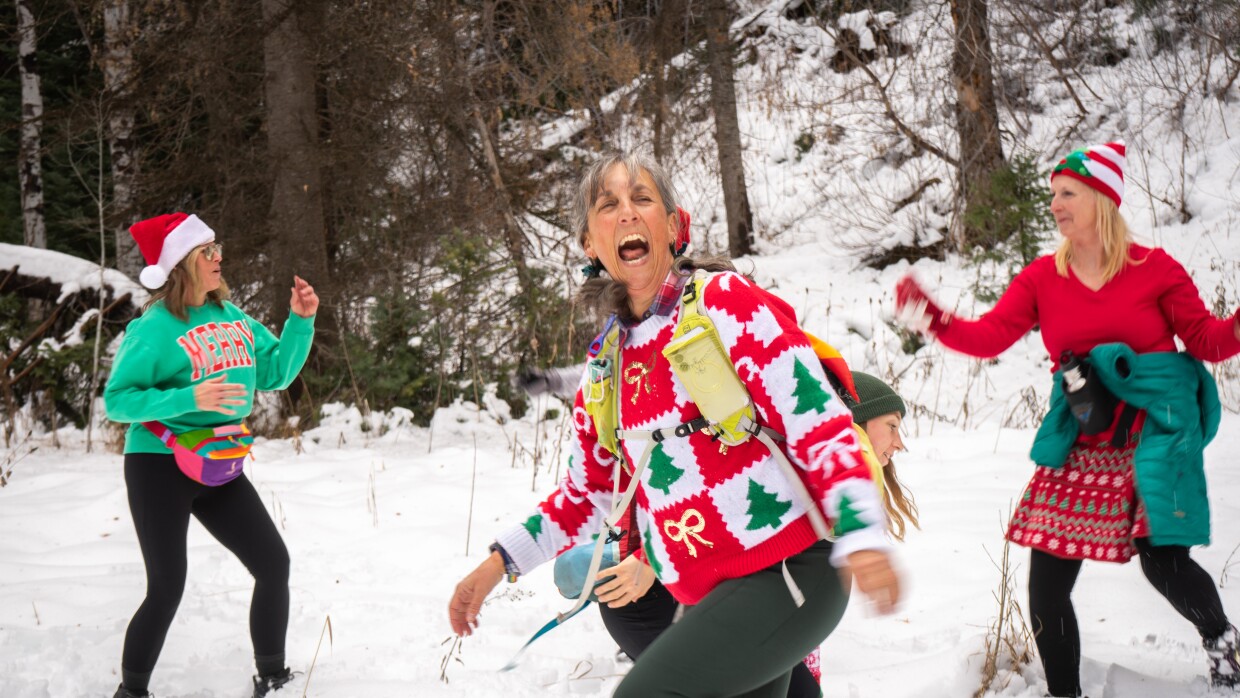 A group of hikers couldn’t help but smile and dance on their hike in American Fork Canyon, Dec. 10, 2025.