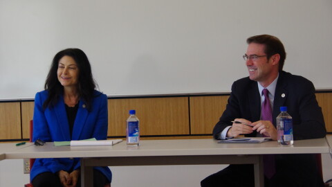 Attorney General Dana Nessel (left) and State Senator Sean McCann (left) speak at a roundtable discussion on energy affordability held at Western Michigan University's Sangren Hall on Monday, September 28, 2026.