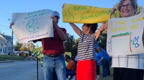 Worshippers at Temple Bnai Israel in Willimantic hold a rally in favor of solar energy on October 6, 2025.