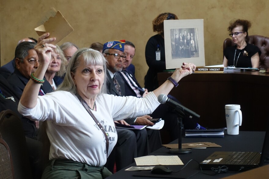 At a meeting of the L.A. Coliseum Commission, Kyle Orlemann, the wife and daughter of military veterans, testified against changing the stadium's name to United Airlines Memorial Coliseum.