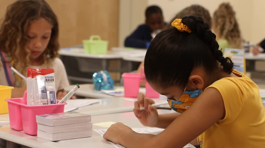 Girl in mask at school