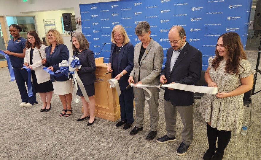 Officials cut the ribbon to the renovated library and nursing suite at Penn State Scranton.