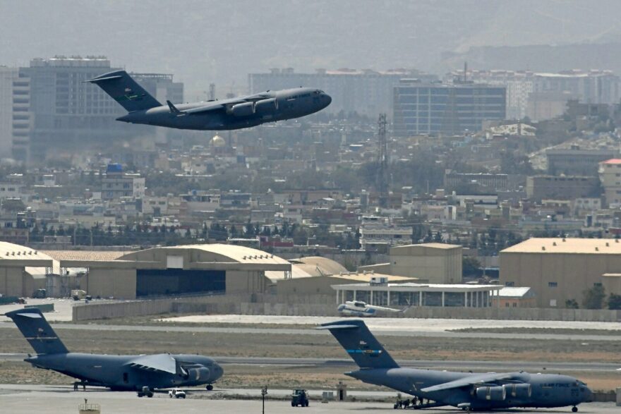 TOPSHOT - An US Air Force aircraft takes off from the airport in Kabul on August 30, 2021. - Rockets were fired at Kabul's airport on August 30 where US troops were racing to complete their withdrawal from Afghanistan and evacuate allies under the threat of Islamic State group attacks. (Photo by Aamir QURESHI / AFP) (Photo by AAMIR QURESHI/AFP via Getty Images)