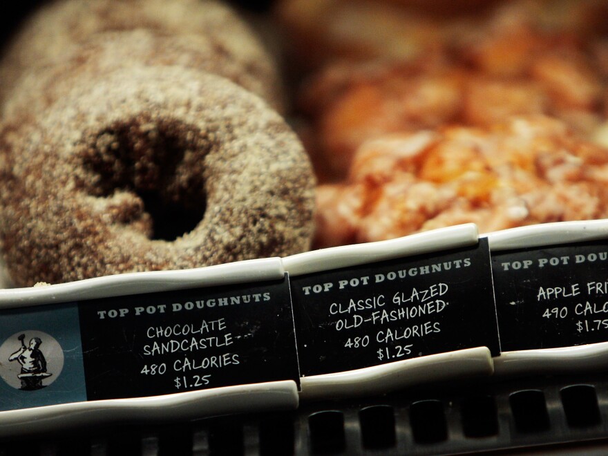 Calories are listed next to menu items in a Starbucks coffee shop in 2008 in New York City.