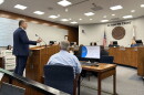 CEMEX executive Nathan Layfield gestures from the podium during Thursday's Fresno County Planning Commission hearing regarding the company's proposed blast mine near the San Joaquin River north of Fresno.