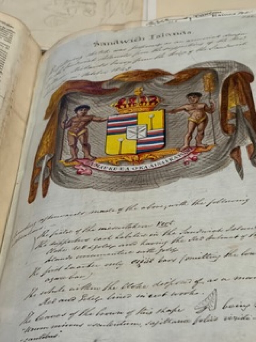 The Hawaiian Kingdom Coat of Arms displayed at “Hawaiʻi: a kingdom crossing oceans."