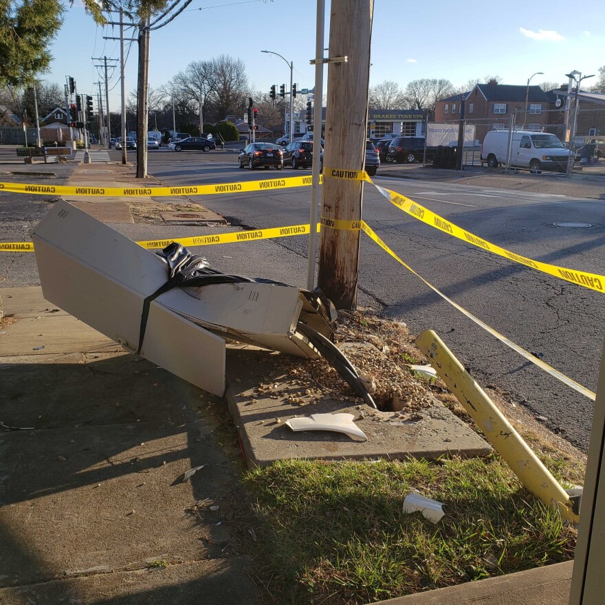  A utilities box and safety pole are damaged due to a vehicle crash near the intersection of Macklind Avenue and Chippewa Street.