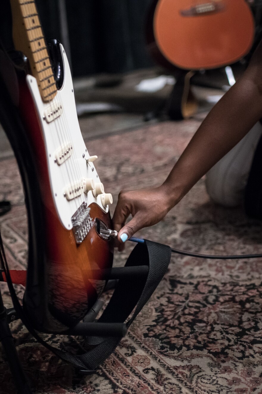 Tamko's parents eventually surprised her with an acoustic guitar when she was 17, just about to graduate. She remembers screaming when she found the instrument in the bathroom (still in its box from Costco) and then setting to work learning how to play it.