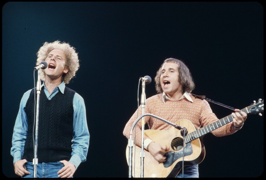 Simon & Garfunkel, photographed while performing in 1965 by Bernard Gotfryd.