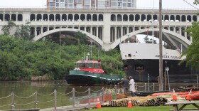 The American Courage cargo ship travels down the Cuyahoga River passing Irishtown Bend.