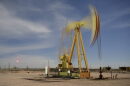 A pumpjack operates north of Carlsbad, NM.