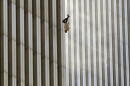 A person falls from the north tower of New York's World Trade Center Tuesday Sept. 11, 2001, after terrorists crashed two hijacked airliners into the World Trade Center and brought down the twin 110-story towers. (Richard Drew/AP)