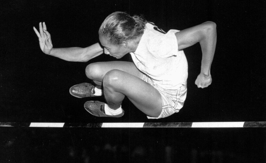 Alice Coachman of Albany, Ga., clears the bar at five feet to win the running high jump in Women's National Track Meet in Grand Rapids July 6, 1948. (AP PHOTO)