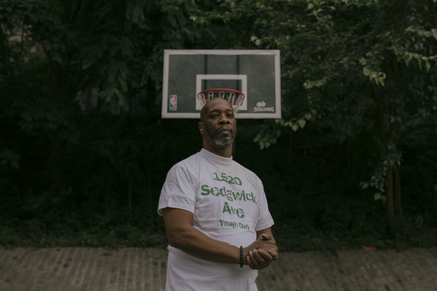 Jerry Leader, a resident of 1520 Sedgwick Avenue during his youth, stands for a portrait at a basketball court.