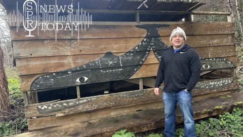 Daniel Greene, vice president of the Makah Whaling Commission, stands in front of a re-constructed longhouse on his family property in Waatch, the oldest of five original Makah villages, carbon dated at nearly 4,000 years old