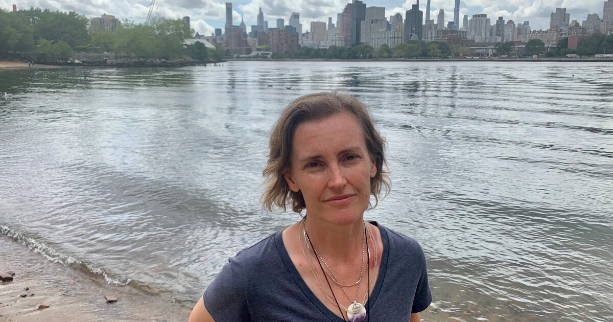 Amber Sunde This artist gets up to her neck in water to spread awareness of climate ...
