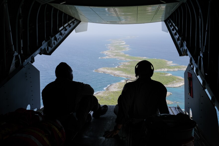 Members of the U.S. Coast Guard search remote Bahamian islands for evidence of rafters in August, 2022.