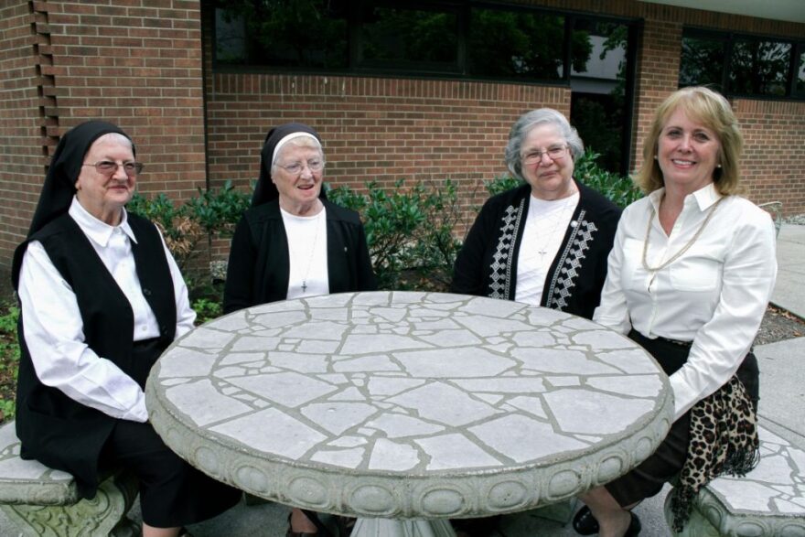 CEO of the Pallottine Foundation Janell Ray, right, sits with Sisters Mary Grace Barile, Mary Terence Wall and Joanne Obrochta, right to left.