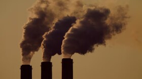 FILE - Emissions rise from smokestacks at a coal power plant in Kansas, Sept. 18, 2021. The Trump administration acted to end federal climate response on Tuesday, but Gov. Tina Kotek said Oregon will continue the fight.