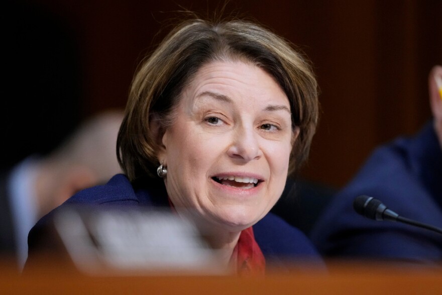 \Sen. Amy Klobuchar, speaking wearing a blue jacket.