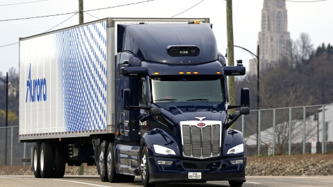 A self-driving tractor trailer maneuvers around a test track in Pittsburgh, Thursday, March 14, 2024. The truck, outfitted with 25 laser, radar and camera sensors, is owned by Pittsburgh-based Aurora Innovation Inc. Late this year, Aurora plans to start hauling freight on Interstate 45 between the Dallas and Houston areas with 20 driverless trucks.