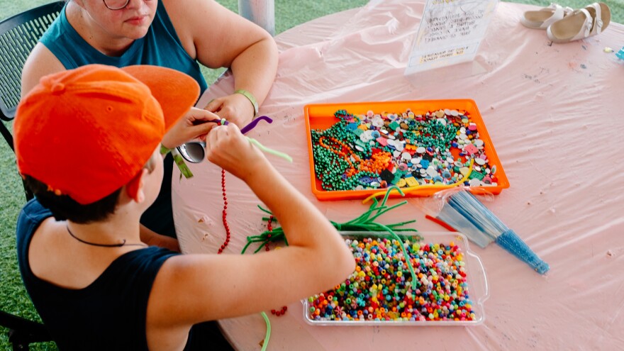 Tucked away from the loud music, the Hinterkids tent offered a bevy of activities to keep young ones entertained over the long weekend. Besides the coloring book, kids were able to decorate sunglasses, tie dye their own scarves, make funky bucket hats and contribute to a commemorative mural.