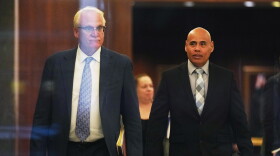 Christian Castro, right, an immigration officer who is accused of shooting a Venezuelan man during the immigration crackdown in Minneapolis early this year and lying to investigators about what happened, leaves with his attorney Daniel Gerdts, left, after a hearing at the Warren E. Burger Federal Building, Friday, Sept. 18, 2026, in St. Paul, Minn.