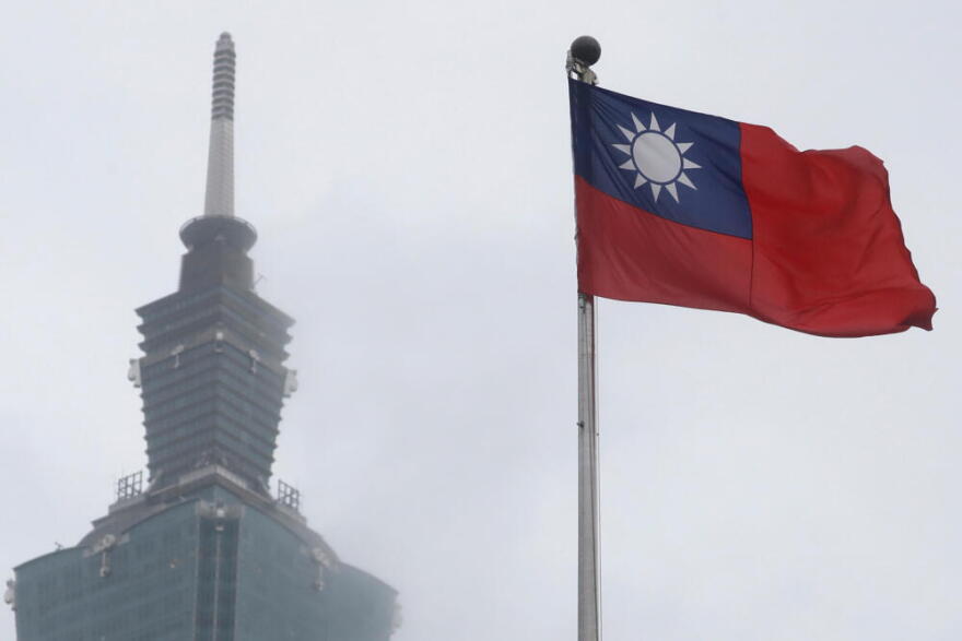 A Taiwan national flag flutters near the Taipei 101 building at the National Dr. Sun Yat-Sen Memorial Hall in Taipei, Taiwan, May 7, 2023. (Chiang Ying-ying/AP)
