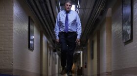 U.S. Sen. Joe Manchin (D-WV) walks through a hallway in the basement of the U.S. Capitol in Washington, DC. 