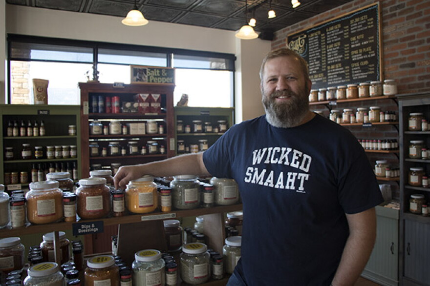 Electric vehicle owner Able Blakley in his Oklahoma City spice shop. 