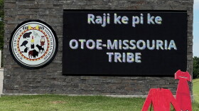 A red dress and shirt silhouette were placed outside of the Otoe-Missouria Tribe's tribal complex during May as a reminder of the Missing and Murdered Indigenous People's crisis.
