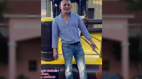 Freddy Tellez Lopez stands in the middle of this edited photo, with an immigrant detention facility in the background.
