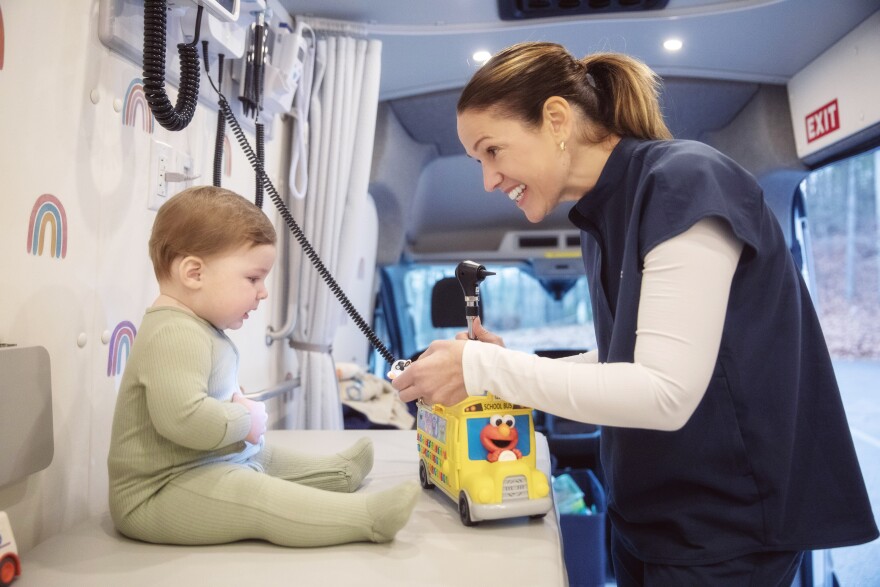 Salem nurse practitioner Melissa Carter in her mobile medical unit. She provides pediatric care from her van daily until 10 p.m., in southern New Hampshire and northern Massachusetts.