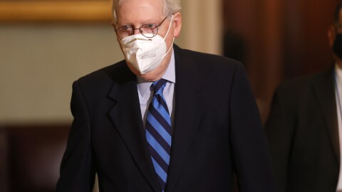 Senate Majority Leader Mitch McConnell leaves the Senate chamber on Tuesday. In remarks, he publicly denounced President Trump for instigating the Jan. 6 insurrection on the Capitol.
