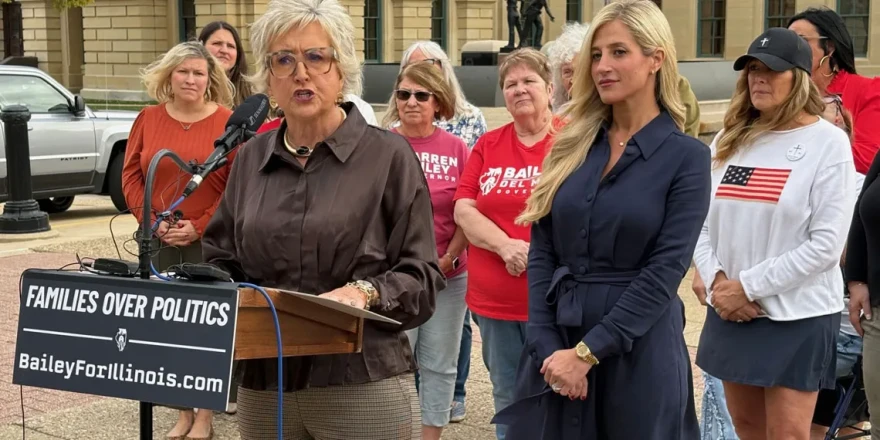 Cindy Bailey, left, wife of Republican governor candidate Darren Bailey, speaks at a news conference outside the Illinois Capitol alongside conservative activist Kristina McCloy on Tuesday, Oct. 27, 2026.