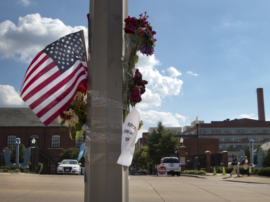 A makeshift memorial hangs on a lamp post across the street from the Washington Navy Yard, on Sept. 20.