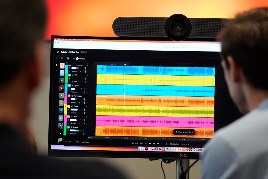 Waveforms of audio files from various instruments are displayed on a computer screen during the creation of an AI musical piece at SUNO, Tuesday, Jan. 13, 2026, in Cambridge, Mass.